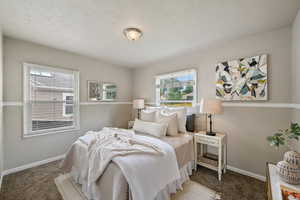 Bedroom with carpet flooring