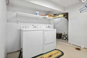 Laundry area featuring independent washer and dryer