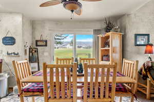 Dining room featuring a ceiling fan