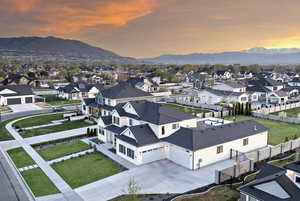 Aerial view at dusk of a mountain view and a residential view