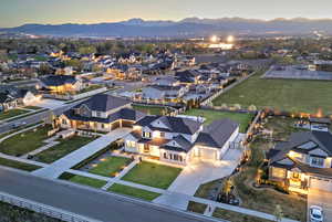 Aerial view of residential area featuring mountains