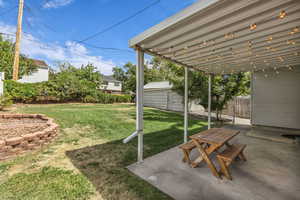 View of yard with a patio area
