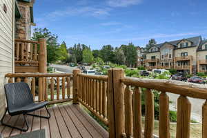 Wooden deck featuring a residential view