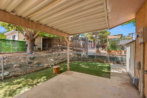 Fenced backyard featuring a patio area