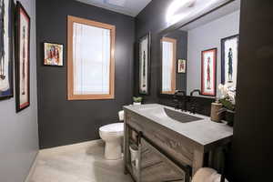 Bathroom with vanity and toilet