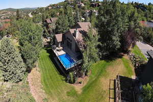 View from above of property featuring a pool area