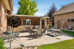 View of patio with outdoor dining area