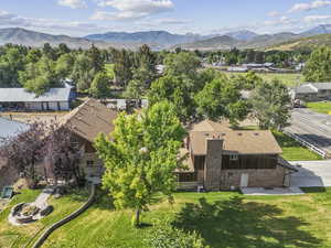 View of subject property featuring mountains