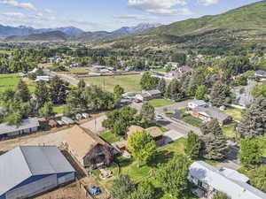 Aerial view of residential area with a mountainous background