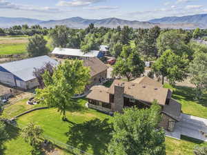 View of subject property with a mountainous background