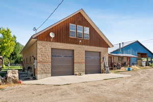 Garage featuring a detached garage