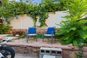 Fenced backyard featuring a patio area