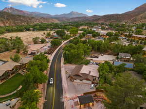 Aerial overview of property's location with a mountain backdrop