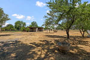 View of yard featuring an outdoor structure