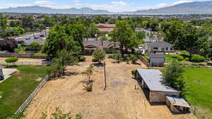 Aerial perspective of suburban area featuring a mountain backdrop