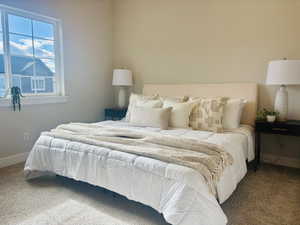 Bedroom featuring carpet floors