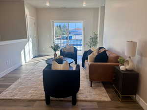 Sitting room with wood finished floors