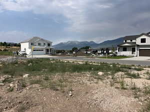 Mountain view featuring nearby suburban area