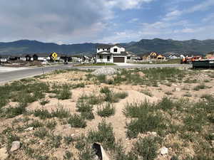 Mountain view featuring nearby suburban area