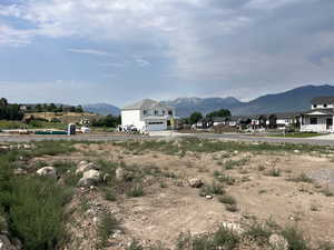 View of mountain backdrop with nearby suburban area