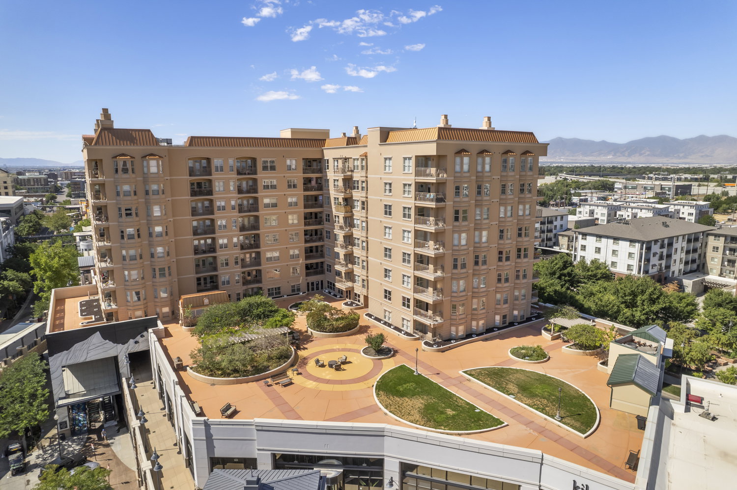 View of building exterior with a mountain view and a city view