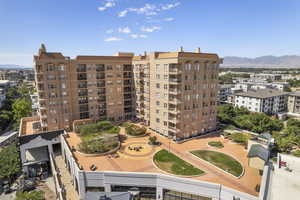 View of building exterior with a mountain view and a city view