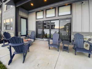 View of patio featuring a fire pit