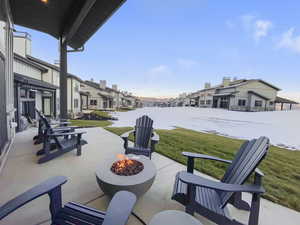 View of patio / terrace featuring an outdoor fire pit