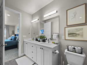 Full bath with ensuite bathroom and double vanity