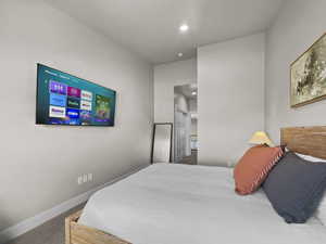Bedroom with baseboards and recessed lighting