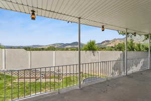 Patio / terrace with a mountain view