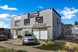 View of front of property featuring brick siding