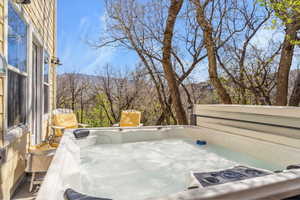 View of patio / terrace featuring a hot tub