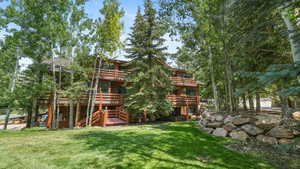 View of property featuring stairway