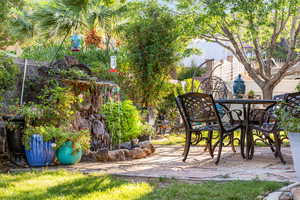 View of yard with a patio