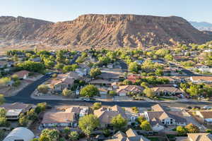 Aerial view of residential area featuring mountains