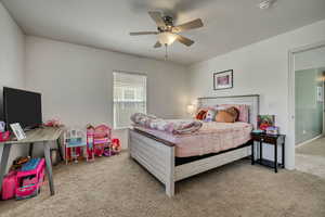 Bedroom with carpet flooring and a ceiling fan