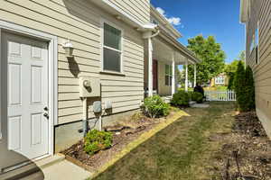 View of yard with covered porch