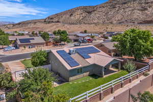 Aerial view of residential area featuring mountains