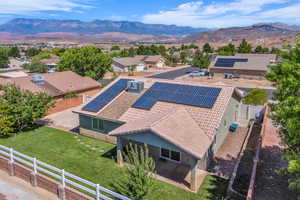 Aerial view of residential area featuring mountains