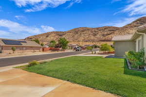 View of mountain backdrop with nearby suburban area