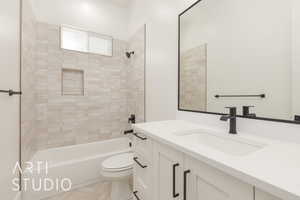 Full bath featuring vanity and shower / washtub combination