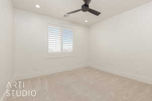 Empty room with carpet flooring, recessed lighting, and ceiling fan