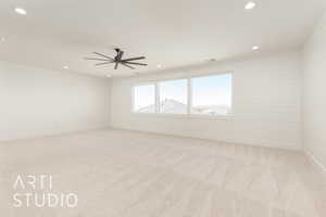 Unfurnished room featuring recessed lighting, light colored carpet, and a ceiling fan