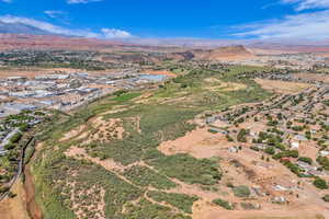 View of property location featuring a mountain backdrop and nearby suburban area