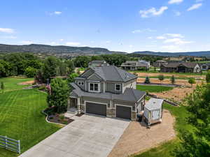Aerial view of residential area with a mountainous background