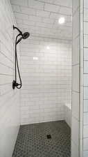 Full bathroom with a shower stall