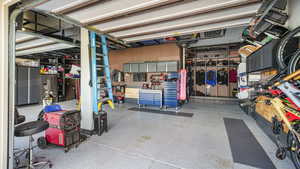 Garage featuring high end fridge