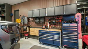 Garage featuring a workshop area