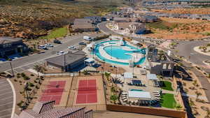 Aerial perspective of suburban area with a pool